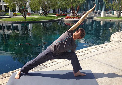 Doug Dee demonstrating a Side Stretch pose