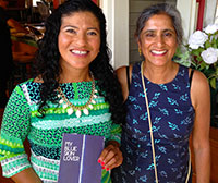 Monona Wali (right) with student Rosa Melendez at a book launch party held in June