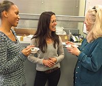Jocelyn Winn (left) and student Jodi Shannahan (right) chat with Lois Leonhardi